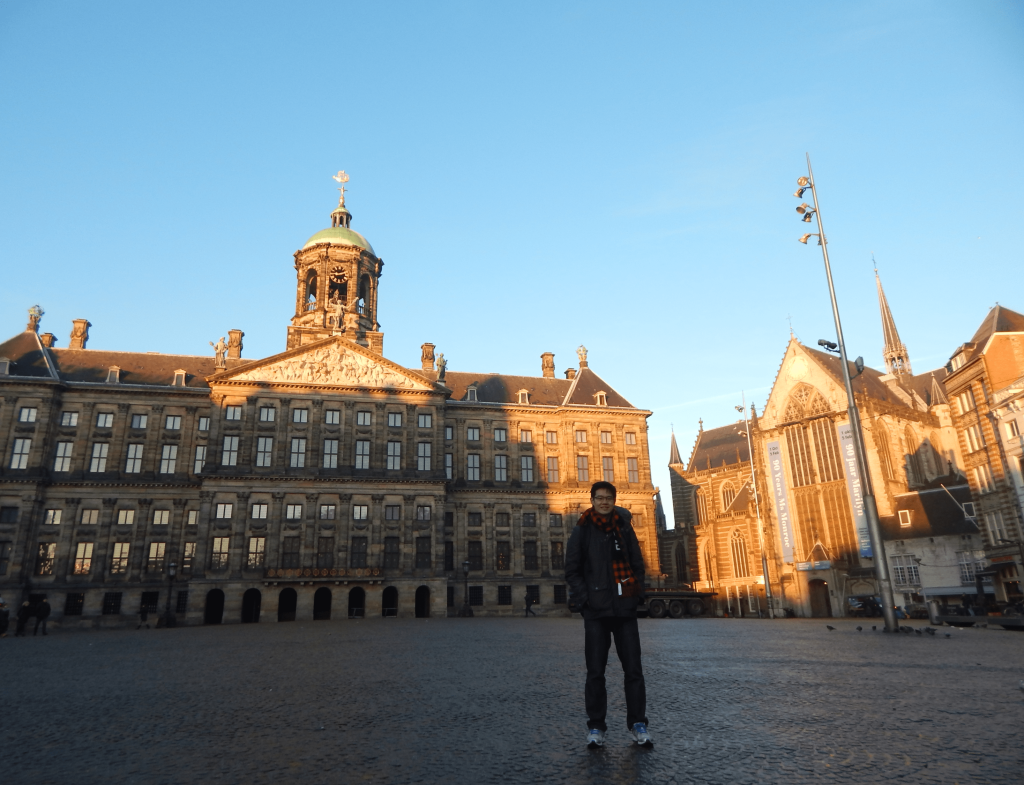 In front of Royal Palace and De Nieuwe Kerk at Dam Square